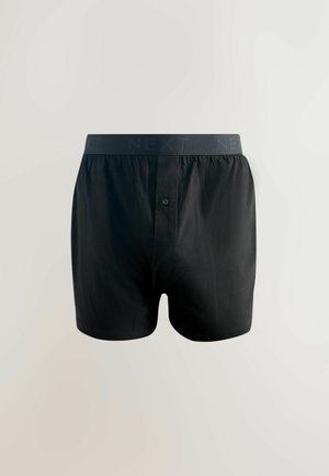 Boxer shorts negri din bumbac, cu talie elastică de marcă NEXT, având închidere cu un singur buton și o textură fină.