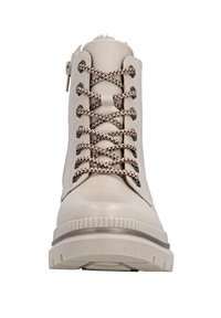 Beige faux leather ankle boot with textured surface, round toe, brown braided laces, and a side zipper. Features a thick, beige rubber sole.