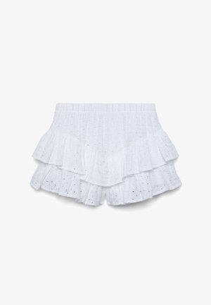 Pantaloncini bianchi in tessuto sangallo con volant sovrapposti e vita elastica, progettati per una vestibilità leggera e traspirante.