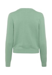 Vihreä neulecardigan, jossa on pitkät hihat, pyöreä pääntie, ribbaus hihansuissa ja helmassa. Silkkinen rakenne ja lyhyt malli. Tasainen takanäkymä.
