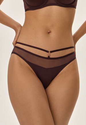 Burgundy women's bikini with sheer panels, double straps featuring a loop accent, and a smooth texture, designed for a fitted look.