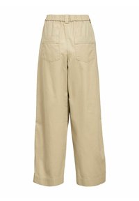 Pantalons beige à jambes larges avec une taille élastique haute, dotés de deux poches arrière et d'un tissu en coton lisse et léger.