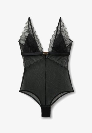 Schwarzer Spitzen-Body mit Netz-Einsätzen, tiefem V-Ausschnitt und dekorativem Besatz. Verfügt über eine goldfarbene Akzentuierung und einen Druckknopfverschluss am unteren Teil.