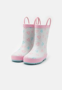 Rain boots with a white glossy surface, pink accents, and a heart pattern in blue and pink. Features pull handles for easy wear.