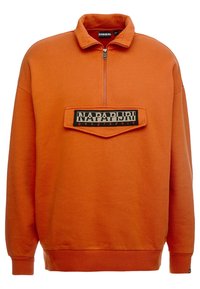 Orange pullover sweatshirt with a half zip, featuring a front pocket with a black label reading "NAPAPIJRI geographic" in white and red text.