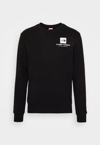 Svart sweatshirt med rund halsringning, ribbade ärmslut och nederkant. Har vit text och logotyp på bröstet samt koordinater för Half Dome, Kalifornien.