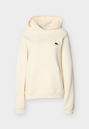 Φούτερ με κουκούλα εκρού χρώματος, με τσέπη καγκουρό και μικρό σκούρο λογότυπο στο αριστερό στήθος, μακριά μανίκια και ριμπ μανσέτες.