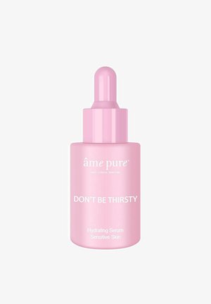 Pink glass dropper bottle with a rounded top, labeled "DON'T BE THIRSTY" and "Hydrating Serum Sensitive Skin" in white text.