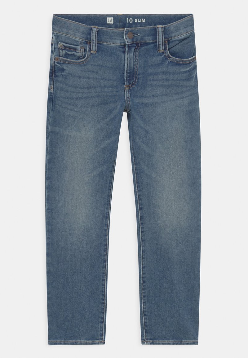 Slim-fit farkut keski sinisessä, joissa on neljä taskua, hillitty häivytys ja klassinen nappi- ja vetoketjusulku.