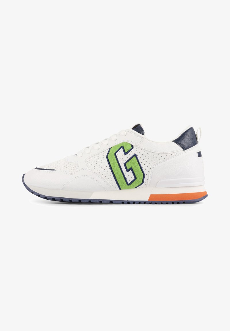 White sneaker with perforated texture, navy accents, and a large green "G" logo. Features an orange accent on the sole and a lightweight design.