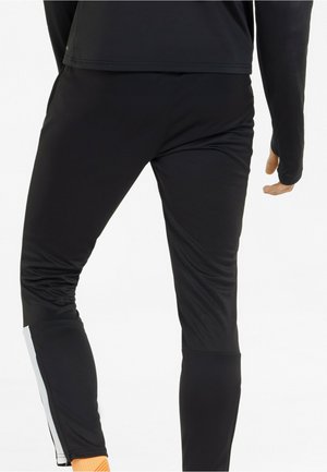 TEAMLIGA TRAINING PANTS - Trainingsbroek - puma black neon citrus