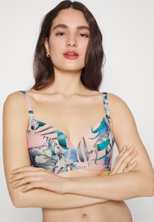Sutiã com base rosa apresentando um padrão de folhas tropicais em verde e azul. Projetado com um decote V profundo e alças ajustáveis.
