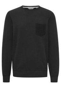 Black crewneck sweatshirt made of soft fabric, featuring a textured dark pocket on the left chest and ribbed cuffs and hem.