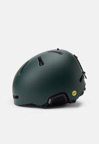 Vihreä matta pyöräilykypärä, jossa on ilmanvaihtoreiät, takasäätöjärjestelmä ja keltainen MIPS-logo sivussa. Suora, pyöreä muoto.