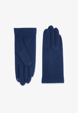 Gants en laine bleu marine avec une texture lisse ; présentent un design à quatre doigts et un pouce avec un accent circulaire au niveau du poignet.