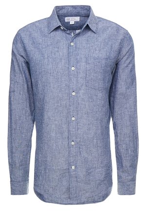 Heren overhemd met lange mouwen van blauwe chambray stof, met kraag en borstzak, casual stijl van GAP.
