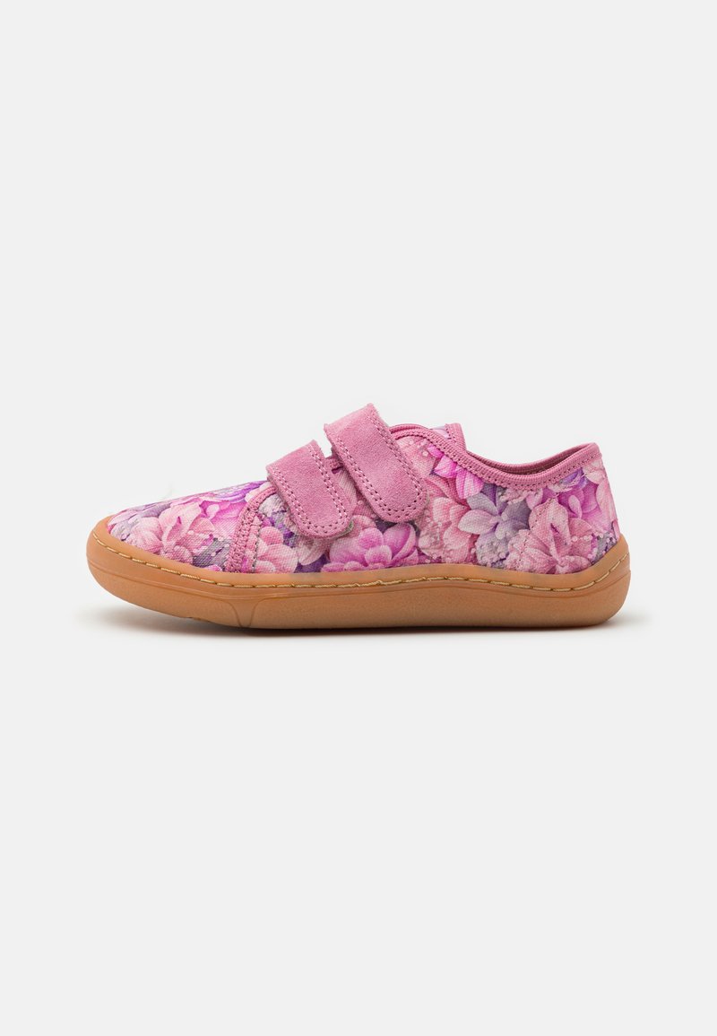 Pink patterned shoes with floral design, Velcro straps, and a tan rubber sole. Features a low-profile design and cushioned interior.