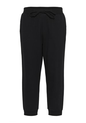 Černé joggingové kalhoty vyrobené z měkké tkaniny, s elastickým pasem a šňůrkou na stažení, se zúženými kotníky a bočními kapsami.