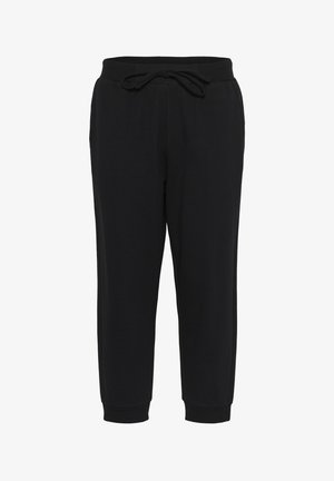 Černé joggingové kalhoty vyrobené z měkké tkaniny, s elastickým pasem a šňůrkou na stažení, se zúženými kotníky a bočními kapsami.