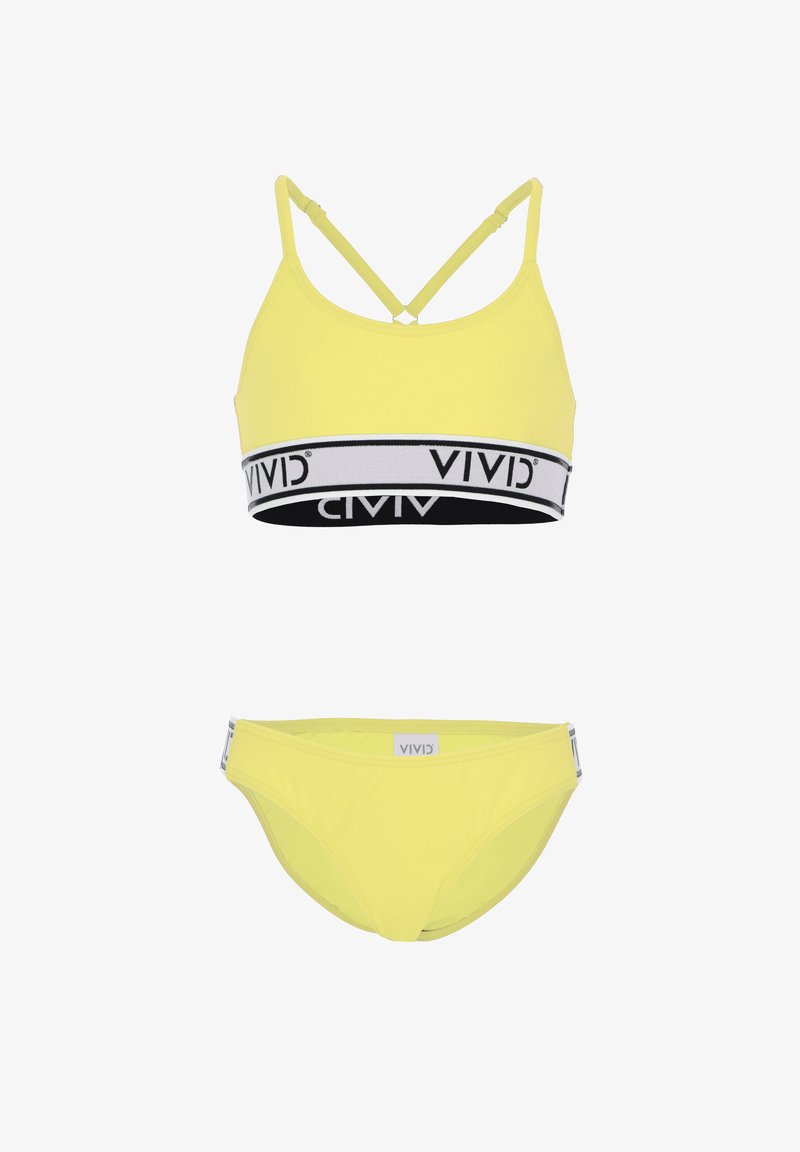 Rumena bikini kompletička z mehkega, elastičnega zgornjega dela z tankimi naramnicami in logotipom, v kombinaciji z ujemajočimi se hlačkami ter diskretnim brandingom.
