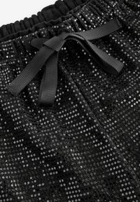 SEQUIN WIDE - Püksid - black