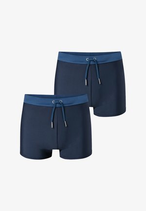 Due paia di pantaloncini da bagno blu navy con fascia in vita azzurra più chiara e coulisse regolabili.