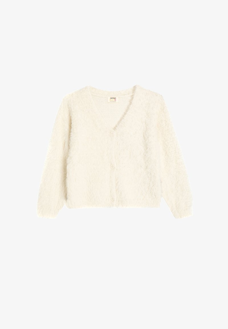 Cardigan bianco fuzzy con scollatura a V, maniche lunghe e tre bottoni sul davanti. Texture morbida e design leggermente cropped.