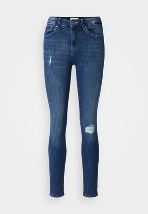 Schmal geschnittene Jeans aus dunkelblauem Denim mit abgetragenen Stellen an den Knien. Sie verfügen über einen Knopf- und Reißverschluss sowie fünf Taschen.