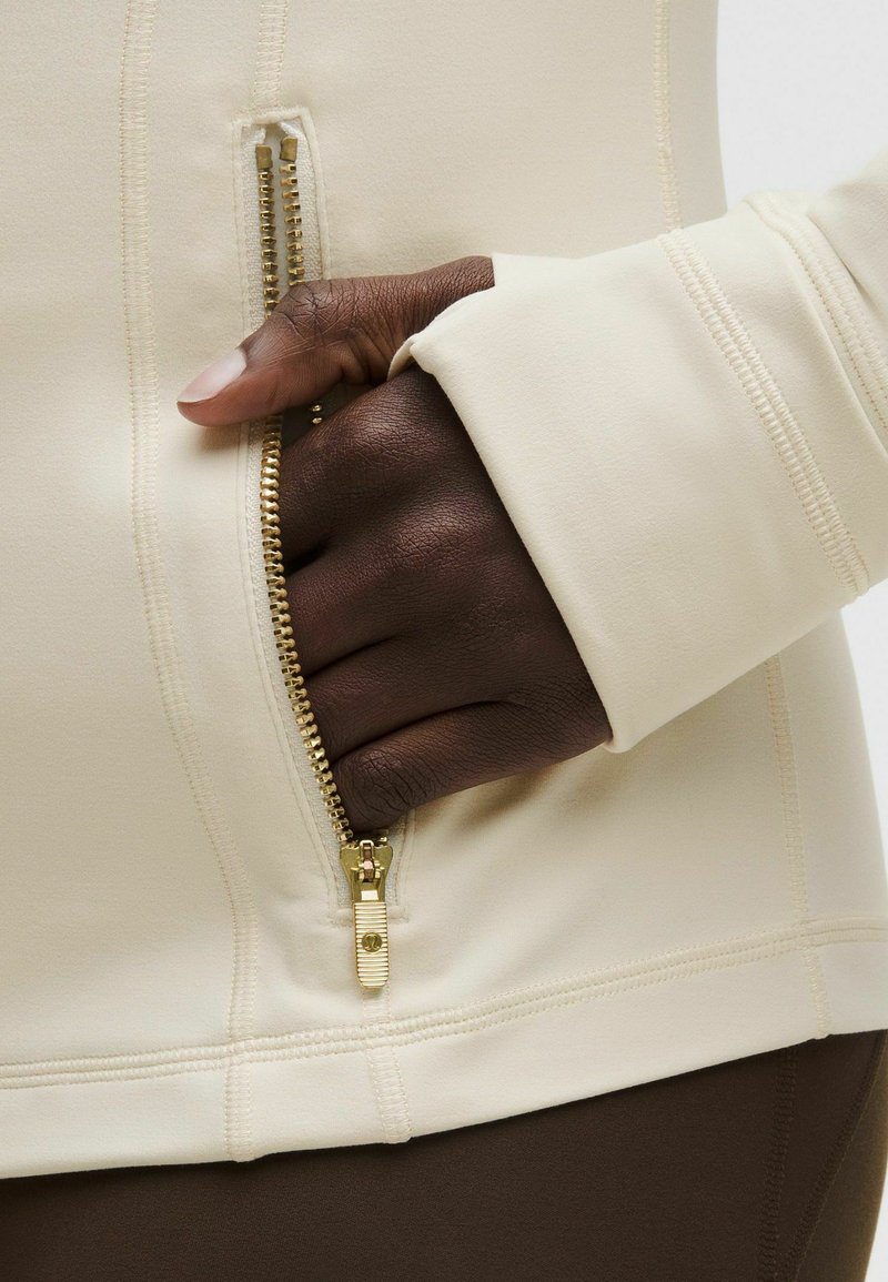 lululemon HOODED DEFINE - Training jacket - light ivory gold/white