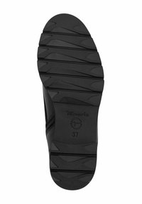 Semelle de chaussure noire avec des rainures profondes pour l'adhérence, logo Tamoris et taille 37 embossés au centre.