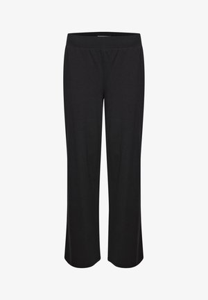 Schwarze weite Hose aus weichem, dehnbarem Stoff. Mit einem elastischen Taillenbund und einer glatten Textur. Keine sichtbaren Muster oder Akzente.