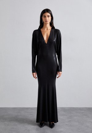 Black long-sleeved gown with a deep V-neck, floor-length design, made of a smooth, shiny fabric, featuring a fitted silhouette.