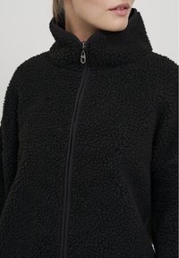Oxmo OXTOVA - Halflange jas - black