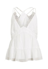 Top blanc sans manches avec bordure en dentelle, fines bretelles croisées, corsage cintré et ourlet évasé à volants.