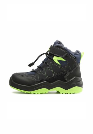 Black and neon green waterproof hiking boot with high ankle, adjustable strap, elastic laces, and fur lining for cold weather.