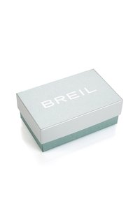 Breil-Box mit einem hellgrauen, strukturierten Deckel und weißem Branding sowie einem türkisfarbenen Boden. Das Design ist rechteckig mit einer glatten Oberfläche.