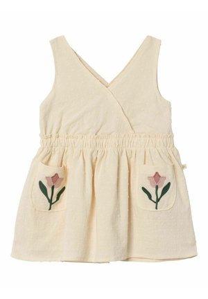 Cremefarbenes ärmelloses Baby-Kleid mit V-Ausschnitt, elastischem Bund, strukturiertem Stoff und zwei vorderen Taschen, jeweils bestickt mit einer rosa Blume und grünen Blättern.