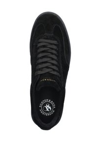Black suede sneaker with black laces, rounded toe, and "Scotch & Soda Amsterdam" logo inside the shoe sole.
