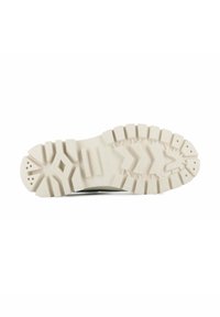 Semelle de chaussure avec un motif de traction en caoutchouc, présentant une semelle extérieure blanche texturée et un léger arc au centre pour le soutien et l'adhérence.