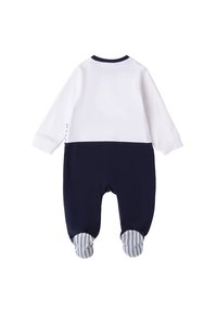 Bodysuit pour bébé bleu marine et blanc avec de longues manches, présentant un design en blocs de couleurs et des accents rayés sur les poignets des pieds. Matériel en coton doux.