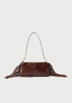 Small dark brown leather handbag with silver chain strap and fringe details on both sides, set against a plain light background.