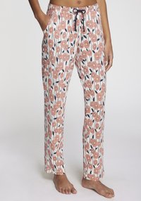 Blommönstrade pyjamasbyxor i rosa och marinblått på en vit bakgrund, med elastisk midja, snörning och sidofickor.