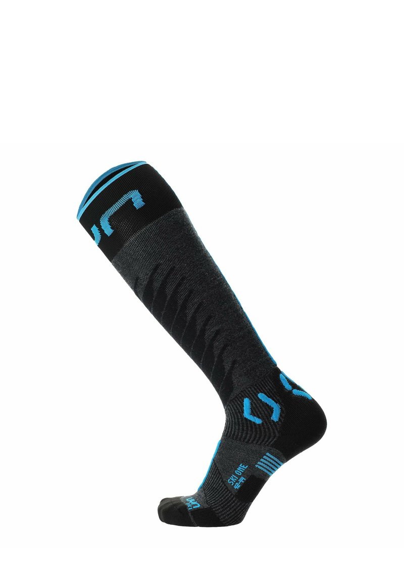 Medias negras hasta la rodilla con acentos azules, patrón texturizado a lo largo de la pierna, puntera y talón reforzados, con un logotipo en el puño.