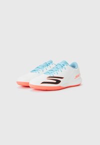 White athletic shoes with a textured upper, light blue laces, black detailing, and a pink sole. Streamlined design for performance.