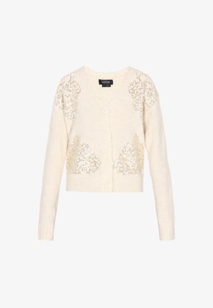 Krémový kardigan s výstřihem do V, zdobený dekorativními zlatými květinovými výšivkami a pěti knoflíky, vyrobený z měkkého strukturovaného pleteného materiálu.