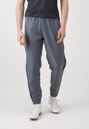 TIRO 25 ESSENTIALS WOVEN - Pantaloni sportivi - team onix/super orange