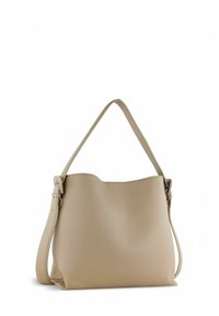 Borsa a tracolla in pelle beige con una texture liscia, tracolla regolabile e un sottile bordo superiore ondulato. Logo impresso sul davanti.