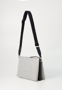 DKNY NALA CROSSBODY - Rankinė per petį - black/neutral