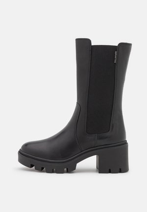 Stivali con plateau - black