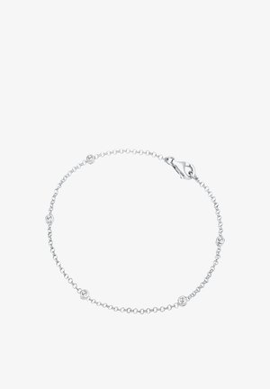 Sidabrinė grandinėlė apyrankė su mažais apvaliais, skaidriais akmenukais, kurie tolygiai išdėstyti tarp grandinėlių, su krabų sagtimi.